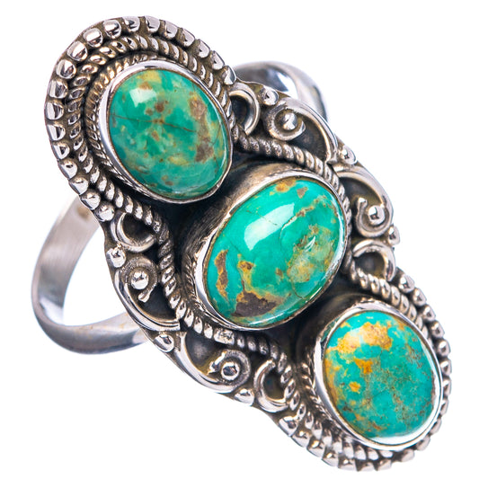 Sterling silver turquoise ring with three oval turquoise cabochons and carved settings