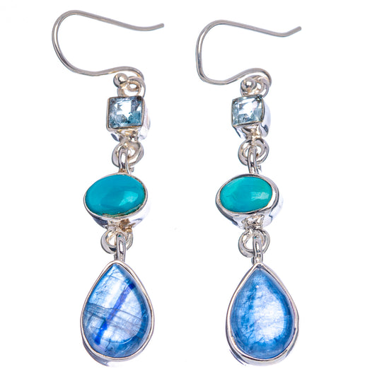 Sterling silver drop earrings with blue topaz square, turquoise oval, and blue teardrop