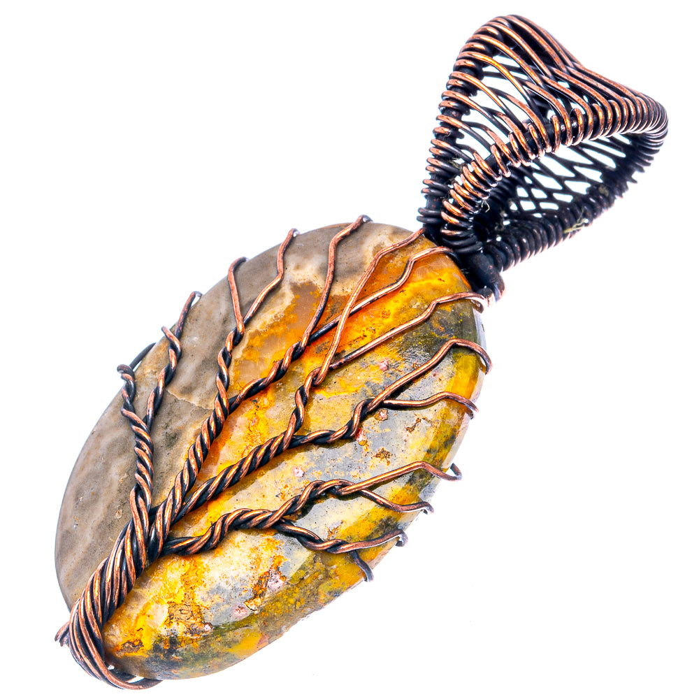 Oxidized copper wire-wrapped jasper pendant with amber stone tree-of-life carving