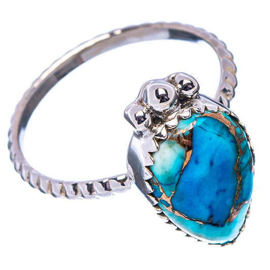Sterling silver ring with oval turquoise cabochon and twisted rope-style band