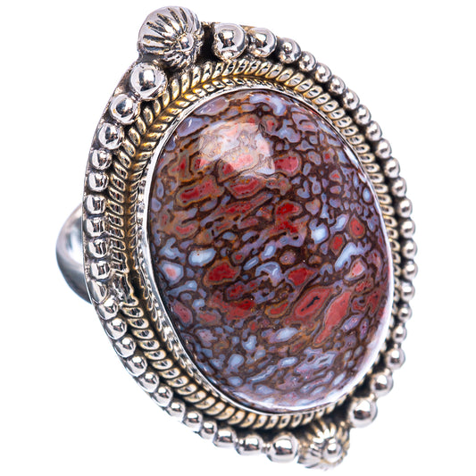 Oval dinosaur bone inlay ring in .925 sterling silver, red and gray pattern, beaded edge