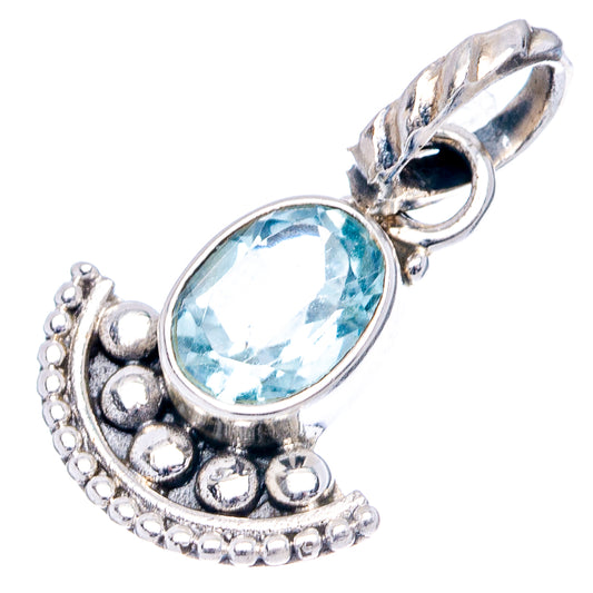Oval blue topaz pendant with .925 sterling silver scalloped frame and clasp bail