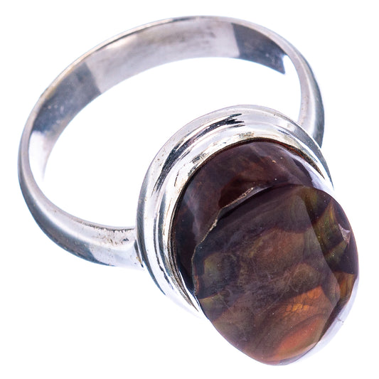 Oval fire agate cabochon set in twisted sterling silver ring, dark with amber flashes