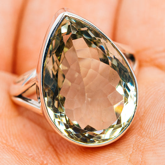 Sterling silver pear-shaped amethyst ring with faceted green gemstone face