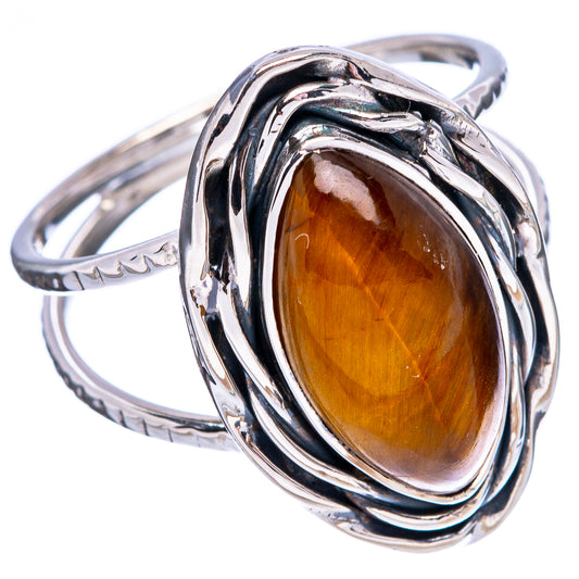 Oval tiger's eye sterling silver ring with sculpted, braided bezel design