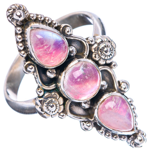 Sterling silver ring featuring three pink oval moonstones with bead-and-flower edge details