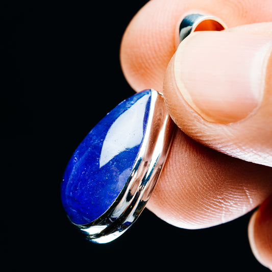 Side view of teardrop tanzanite pendant in .925 sterling silver with bail