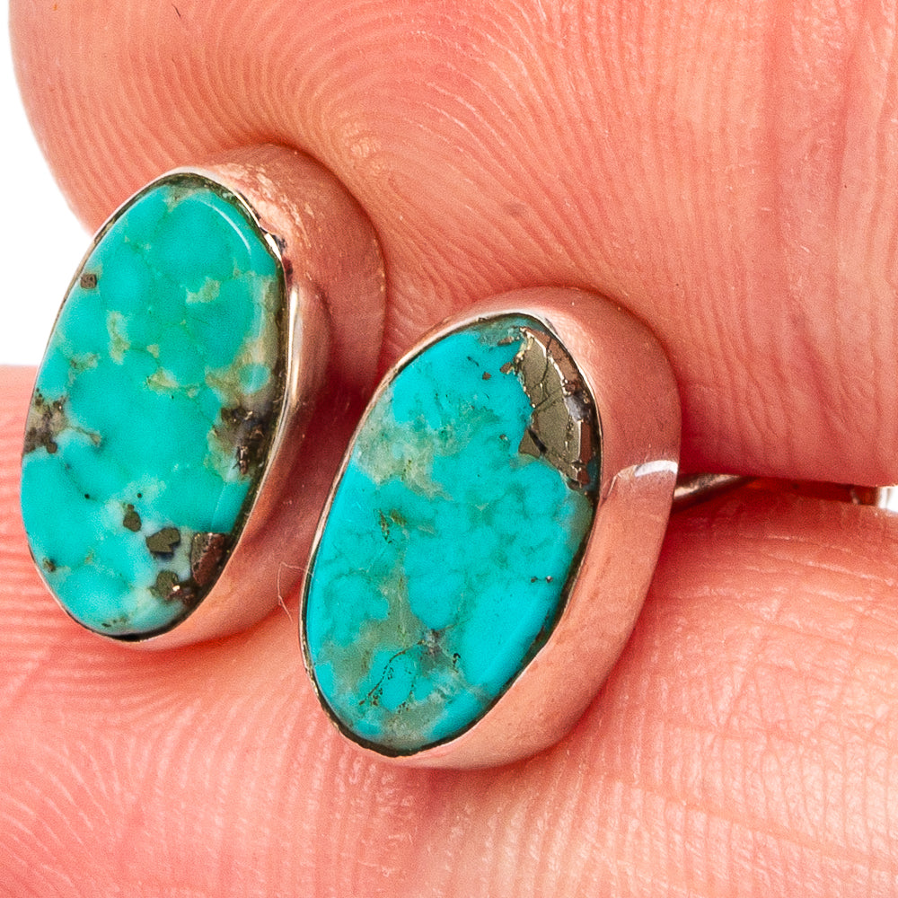 Sterling silver turquoise teardrop stud earrings with oval blue-green stone, bezel set