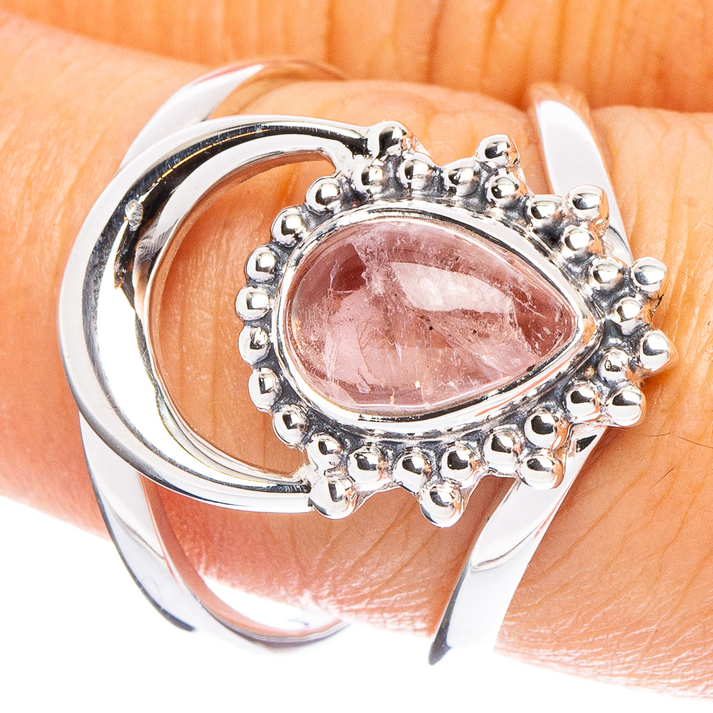 Sterling silver ring with oval rose quartz cabochon and ornate bead-like setting