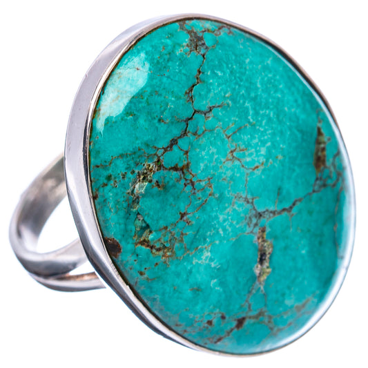 Turquoise cabochon statement ring with sterling silver band, side angle view
