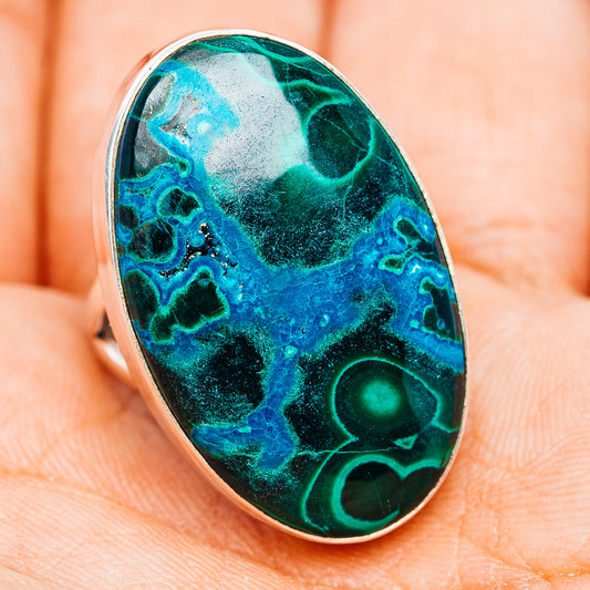 Sterling silver oval gemstone ring with teal-blue chrysocolla pattern, side view