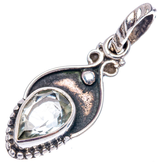 Sterling silver teardrop pendant with clear faceted stone, textured bezel and side loops