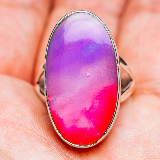 Oval sterling silver opal ring with pink-red aurora glow, size 7.5