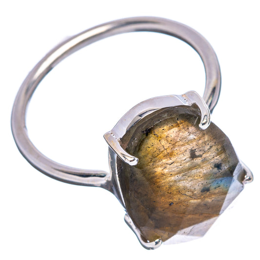 Silver ring with faceted labradorite gemstone and four-prong oval setting, side view