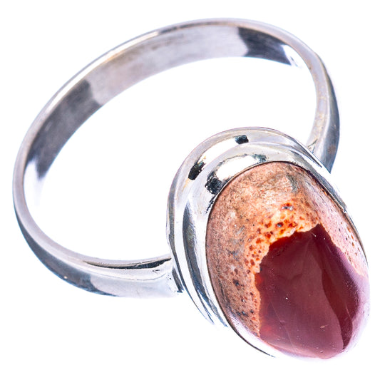 Sterling silver oval fire opal ring with polished red-orange cabochon