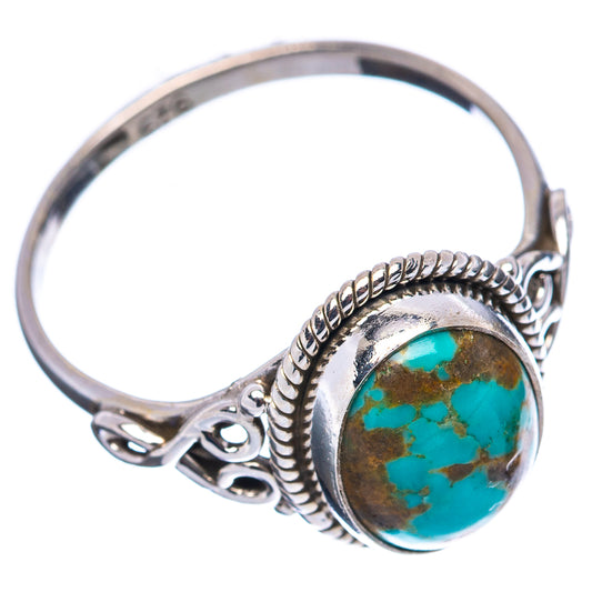 Turquoise oval cabochon ring with .925 sterling silver openwork band, side view