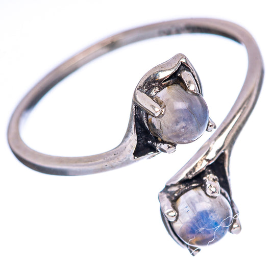 Sterling silver ring with two oval moonstones, iridescent blue and purple prongs