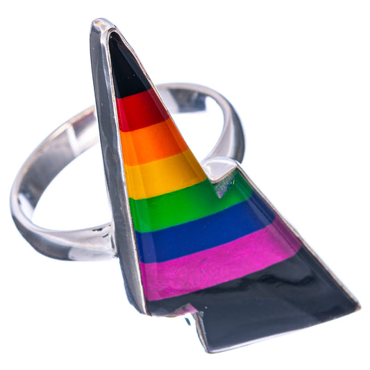 Sterling silver rainbow bolt ring with multicolor stripe in dark setting, side view