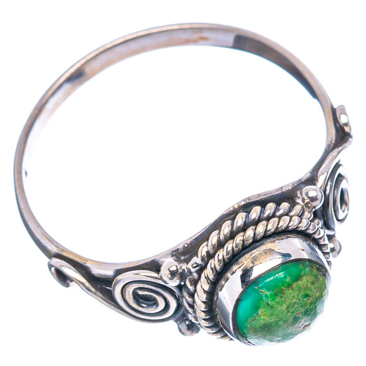 Turquoise oval cabochon sterling silver ring with side scrollwork and rope-texture band