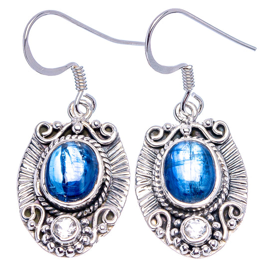 Sterling silver kyanite drop earrings with oval blue cabochon and clear accent stones, fishhook