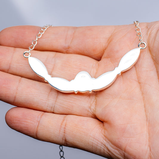 Sterling silver pendant necklace with smooth wing-like teardrop charm