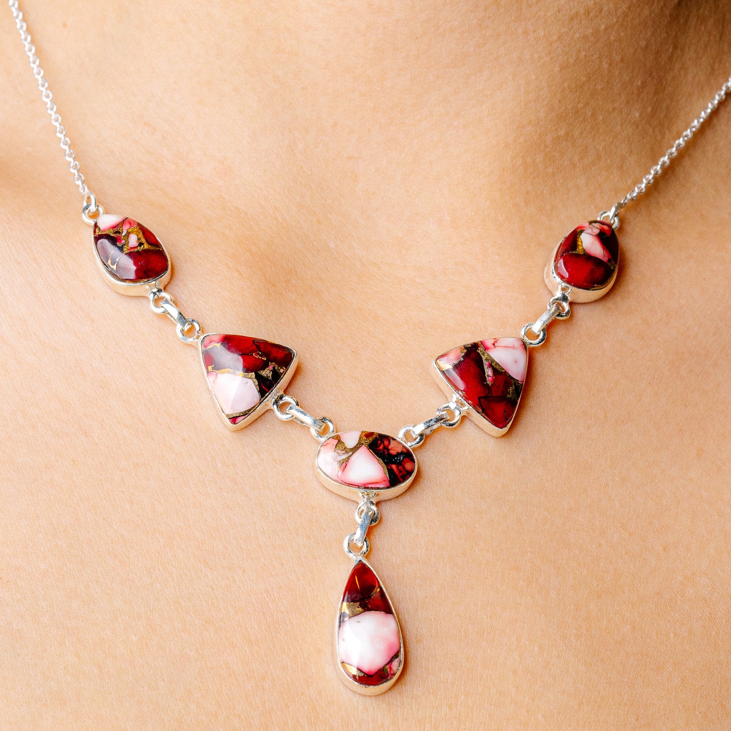 Sterling silver necklace with red and pink composite cabochon teardrops and ovals