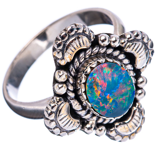 Sterling silver opal cabochon ring, round center stone with detailed side band