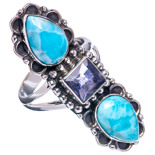 Sterling silver ring with oval blue Larimar stones and dark purple Iolite center, scalloped gallery.