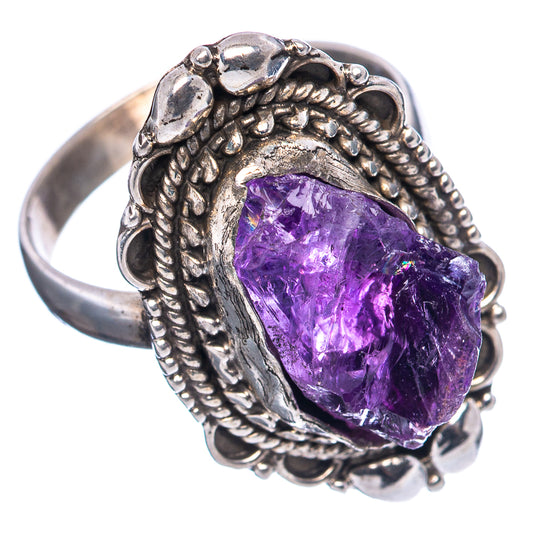 Sterling silver amethyst ring with braided setting and faceted purple gemstone detail