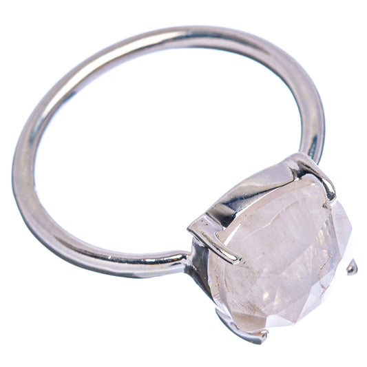 Oval moonstone ring on sterling silver band, side view of faceted stone in prong setting