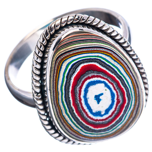 Sterling silver band ring with oval multicolor striped fordite inlay and rope-edge bezel