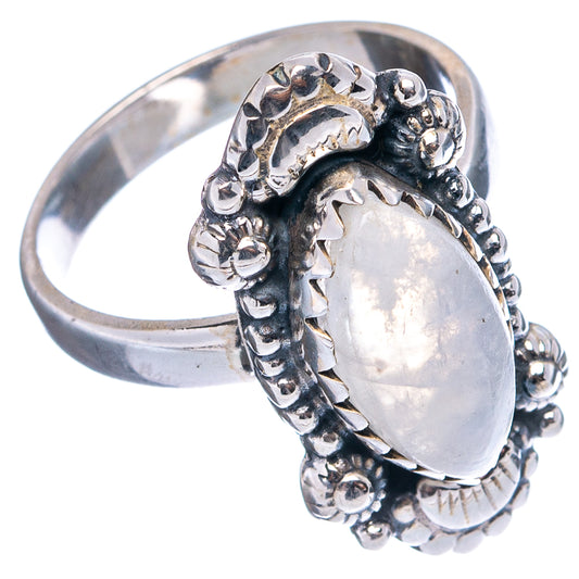 Silver-tone oval moonstone ring with openwork side claws and beaded stone surround