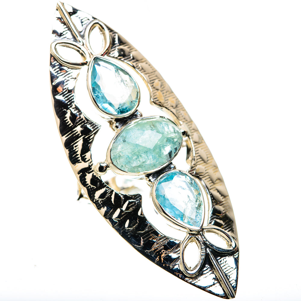 Sterling silver statement ring with three oval aquamarine stones and ornate side engraving