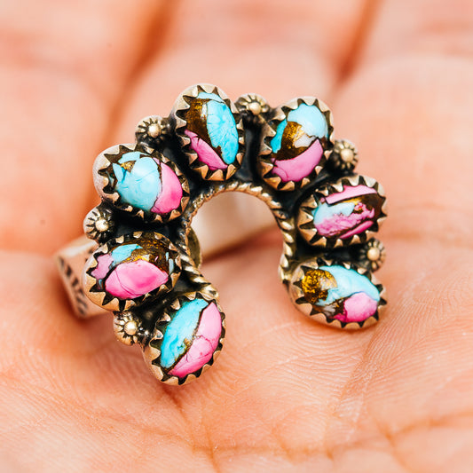 Southwestern Naja-style sterling silver ring with turquoise and pink oval stone inlays