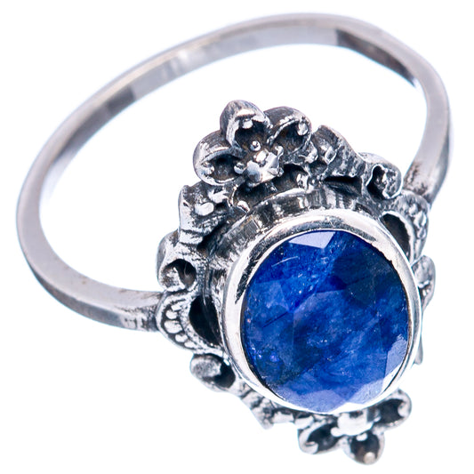 Blue gemstone ring with ornate sterling silver gallery and openwork band, round stone