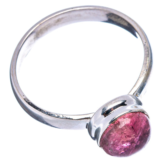 Sterling silver ring with round pink tourmaline bezel, open side view