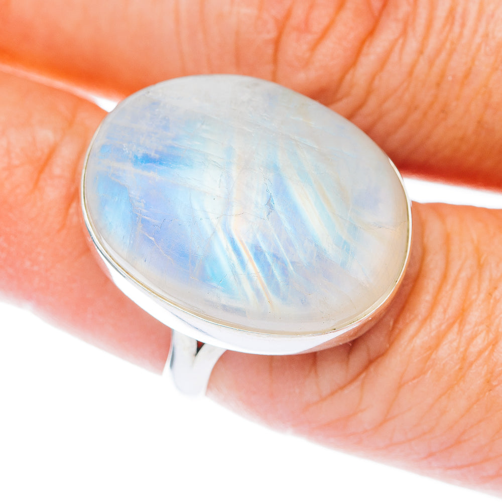 Oval rainbow moonstone cabochon ring with .925 sterling silver band, size 7.75