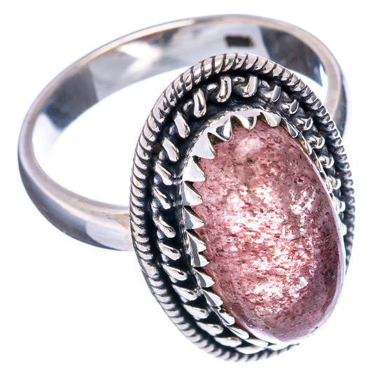 Sterling silver band ring with oval pink-red quartz, twisted rope bezel detail