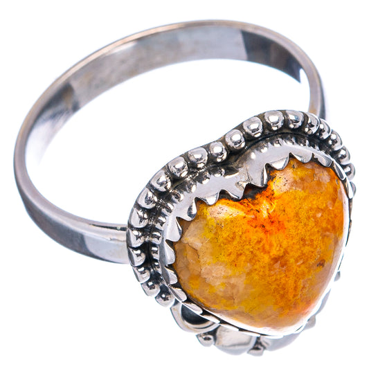 Sterling silver ring with amber-orange jasper cabochon, scalloped beaded edge and band
