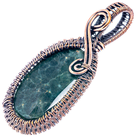 Ocean jasper wire wrap pendant with dark oxidized copper coil and teardrop stone