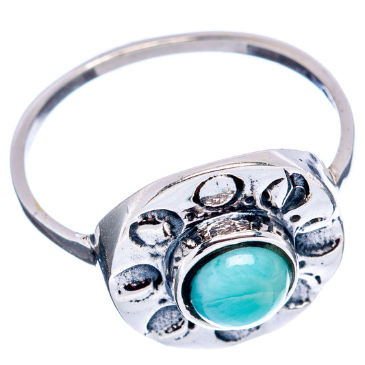 Sterling silver ring with oval turquoise larimar cabochon and engraved floral bezel