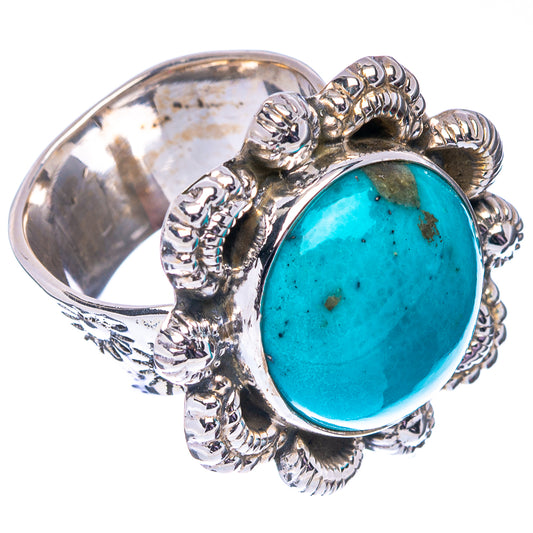 Turquoise oval cabochon ring with .925 sterling silver openwork side scrolls