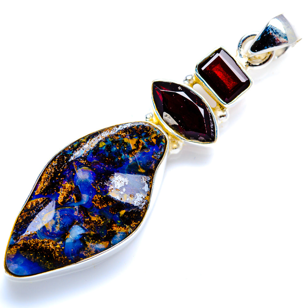 Sterling silver pendant with large teardrop boulder opal, red and dark stone accents