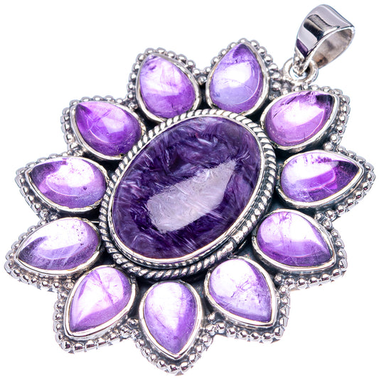Oval amethyst cabochon pendant with petal-shaped stones in .925 sterling silver setting