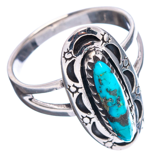 Sterling silver turquoise ring with oval cabochon, raised side bands, black inlay