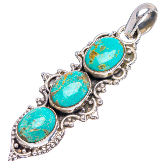 Oval turquoise stone pendant with bail, .925 sterling silver filigree setting.