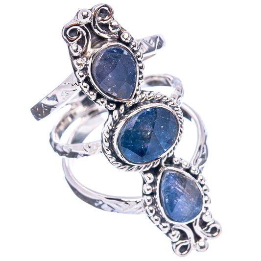 925 sterling silver ring with three oval deep-blue stones and decorative side scrollwork
