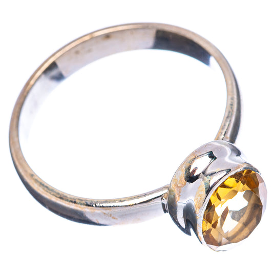 Sterling silver citrine ring size 7.5, round yellow stone on smooth band with open back