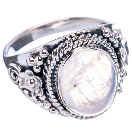 Sterling silver moonstone ring with oval cabochon in textured bezel and side details