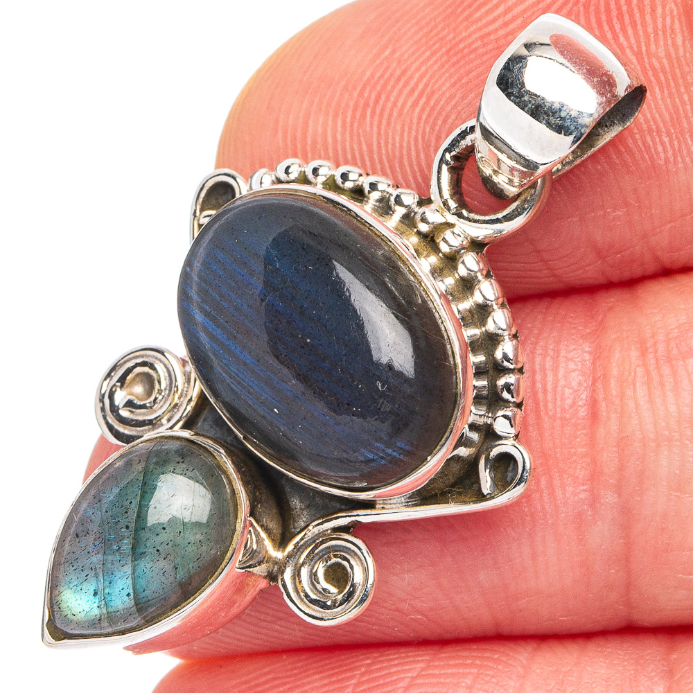 925 sterling silver labradorite pendant with dark blue oval center and teardrop stone